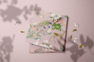 Flora & Fauna Menagerie print on pink fabric