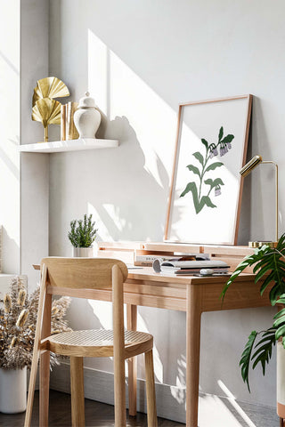 Comfrey print displayed over scandinavian wood desk